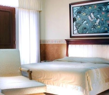 Umm Inn Hotel Malang Pokoj fotografie
